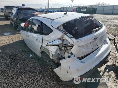 Trzecie zdjęcie samochodu z tyłu: 2014 FORD FOCUS SE VIN:1FADP3K23EL150953 - miniatura