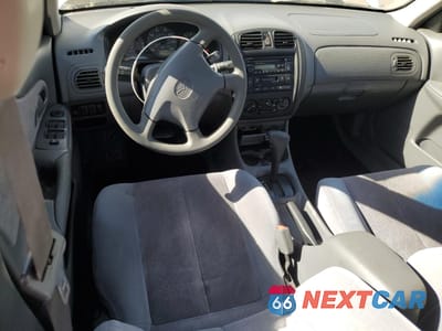 Zdjęcie 8 z 12 samochodu: 1999 MAZDA PROTEGE ES VIN:JM1BJ2213X0121378 - miniatura