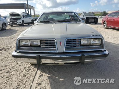 Piąte zdjęcie samochodu w środku: 1980 PONTIAC SUNBIRD VIN:2E27VA7589175 - miniatura