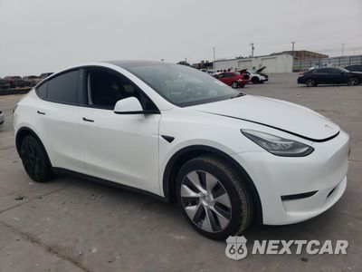 Czwarte zdjęcie samochodu z boku: 2023 TESLA MODEL Y VIN:7SAYGDEE6PA078787 - miniatura
