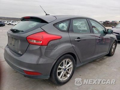 Trzecie zdjęcie samochodu z tyłu: 2016 FORD FOCUS SE VIN:1FADP3K25GL338974 - miniatura
