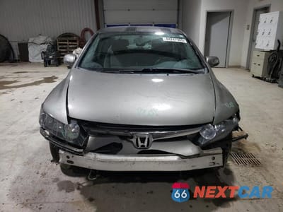 Piąte zdjęcie samochodu w środku: 2006 HONDA CIVIC LX VIN:1HGFA165X6L052020 - miniatura