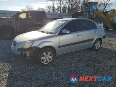 2009 KIA RIO BASE KNADE223696448059 - główne zdjęcie licytacji z USA - miniatura