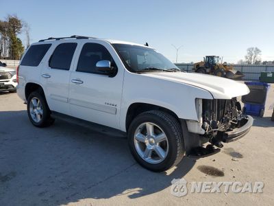 Czwarte zdjęcie samochodu z boku: 2010 CHEVROLET TAHOE C1500 LT VIN:1GNUCBE07AR225114 - miniatura