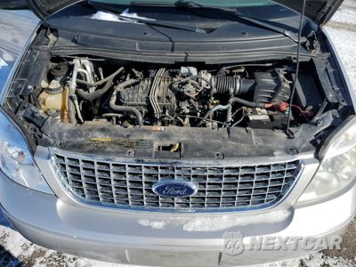 Zdjęcie 13 z 15 samochodu: 2006 FORD FREESTAR SEL VIN:2FMZA52256BA12535 - miniatura