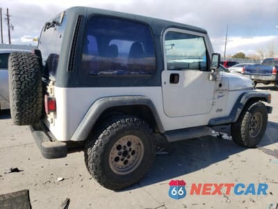 Trzecie zdjęcie samochodu z tyłu: 1998 JEEP WRANGLER / TJ SPORT VIN:1J4FY19S3WP710839 - miniatura