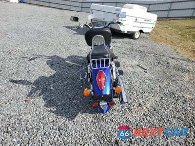 Czwarte zdjęcie samochodu z boku: 2006 HONDA VTX1300 R VIN:1HFSC52666A310175 - miniatura