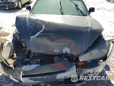 Zdjęcie 11 z 12 samochodu: 2008 HYUNDAI TIBURON GS VIN:KMHHM66D68U292760 - miniatura