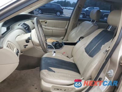 Zdjęcie 7 z 12 samochodu: 2003 TOYOTA AVALON XL VIN:4T1BF28B63U278046 - miniatura