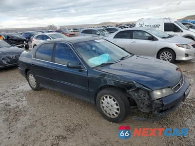 Czwarte zdjęcie samochodu z boku: 1997 HONDA ACCORD EX VIN:1HGCD5659VA081956 - miniatura