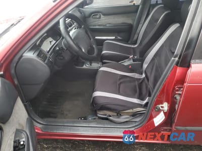 Zdjęcie 7 z 12 samochodu: 1995 TOYOTA COROLLA LE VIN:1NXAE09B6SZ280217 - miniatura