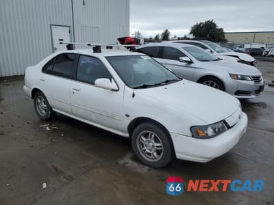 Czwarte zdjęcie samochodu z boku: 1999 NISSAN SENTRA BASE VIN:3N1AB41D4XL095928 - miniatura
