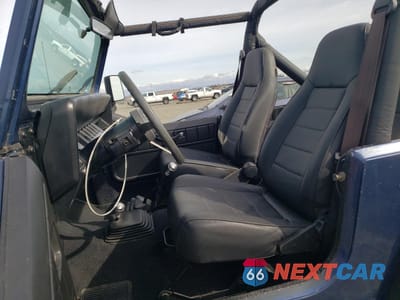 Zdjęcie 7 z 12 samochodu: 1990 JEEP WRANGLER / YJ VIN:2J4FY29T2LJ542439 - miniatura