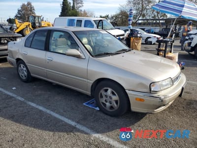 Czwarte zdjęcie samochodu z boku: 1996 INFINITI G20 VIN:JNKCP01D9TT534495 - miniatura