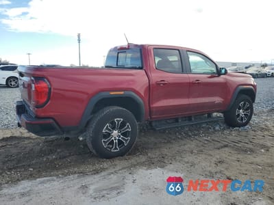 Trzecie zdjęcie samochodu z tyłu: 2024 GMC CANYON AT4 VIN:1GTP6DEK5R1174250 - miniatura