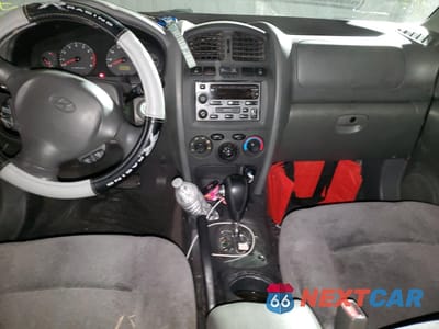 Zdjęcie 8 z 12 samochodu: 2003 HYUNDAI SANTA FE GLS VIN:KM8SC13D83U353745 - miniatura