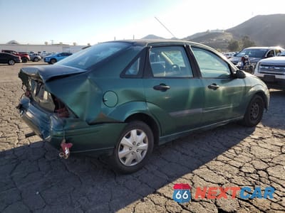 Trzecie zdjęcie samochodu z tyłu: 2000 FORD FOCUS LX VIN:1FAFP33P3YW215712 - miniatura