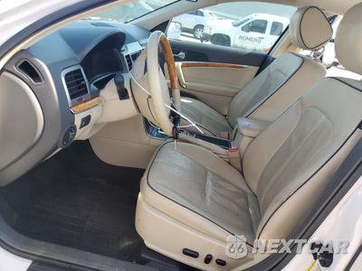 Zdjęcie 7 z 14 samochodu: 2012 LINCOLN MKZ HYBRID VIN:3LNDL2L34CR836534 - miniatura