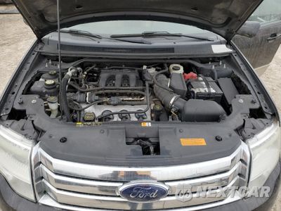 Zdjęcie 12 z 13 samochodu: 2008 FORD TAURUS X EDDIE BAUER VIN:1FMDK07W28GA12445 - miniatura