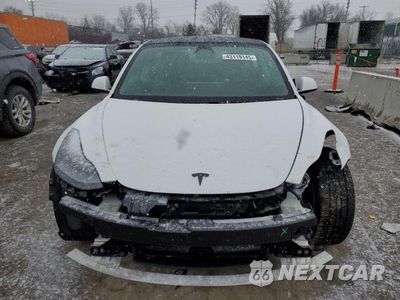 Piąte zdjęcie samochodu w środku: 2021 TESLA MODEL 3 VIN:5YJ3E1EAXMF048232 - miniatura