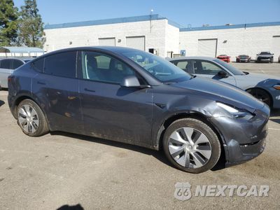 Czwarte zdjęcie samochodu z boku: 2023 TESLA MODEL Y VIN:7SAYGDED1PF934944 - miniatura