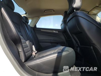 Zdjęcie 10 z 12 samochodu: 2017 FORD FUSION SE HYBRID VIN:3FA6P0LU2HR359694 - miniatura