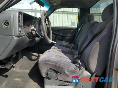 Zdjęcie 7 z 12 samochodu: 1999 GMC NEW SIERRA C1500 VIN:1GTEC14WXXZ523355 - miniatura