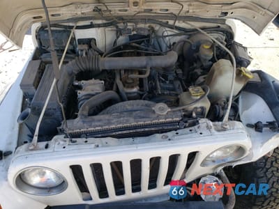 Zdjęcie 12 z 13 samochodu: 1998 JEEP WRANGLER / TJ SPORT VIN:1J4FY19S3WP710839 - miniatura