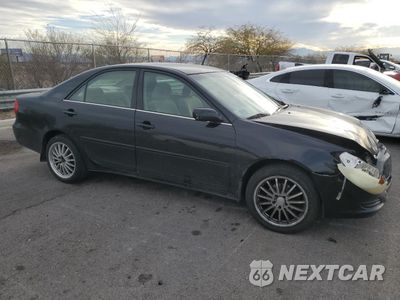 Czwarte zdjęcie samochodu z boku: 2002 TOYOTA CAMRY LE VIN:4T1BE32K92U096938 - miniatura