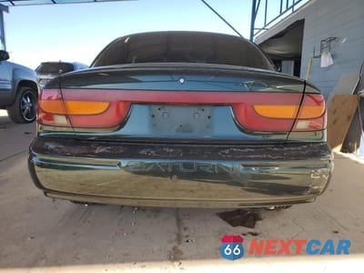 Zdjęcie 6 z 12 samochodu: 2002 SATURN SL2 VIN:1G8ZK54732Z167600 - miniatura