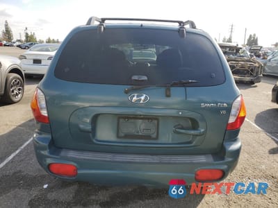 Zdjęcie 6 z 13 samochodu: 2002 HYUNDAI SANTA FE GLS VIN:KM8SC13D92U170093 - miniatura