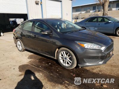Czwarte zdjęcie samochodu z boku: 2015 FORD FOCUS SE VIN:1FADP3F21FL235009 - miniatura