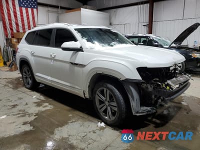 Czwarte zdjęcie samochodu z boku: 2019 VOLKSWAGEN ATLAS SE VIN:1V2XR2CAXKC604336 - miniatura