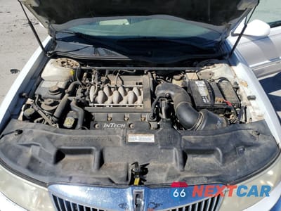 Zdjęcie 12 z 13 samochodu: 2000 LINCOLN CONTINENTAL VIN:1LNHM97V2YY802541 - miniatura