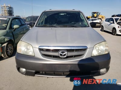 Piąte zdjęcie samochodu w środku: 2003 MAZDA TRIBUTE LX VIN:4F2YZ941X3KM52191 - miniatura