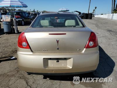 Zdjęcie 6 z 12 samochodu: 2005 PONTIAC G6 VIN:1G2ZG528454121878 - miniatura