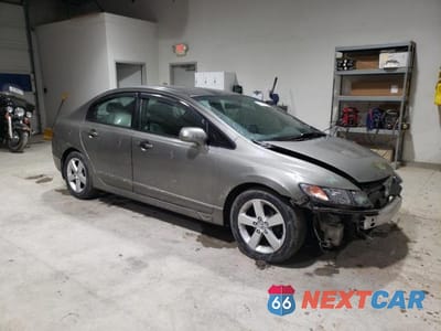 Czwarte zdjęcie samochodu z boku: 2006 HONDA CIVIC LX VIN:1HGFA165X6L052020 - miniatura