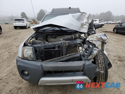 Piąte zdjęcie samochodu w środku: 2011 NISSAN XTERRA OFF ROAD VIN:5N1AN0NW2BC525271 - miniatura