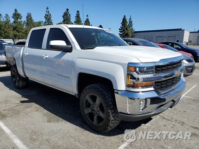 Czwarte zdjęcie samochodu z boku: 2018 CHEVROLET SILVERADO C1500 LT VIN:3GCPCREC3JG200722 - miniatura