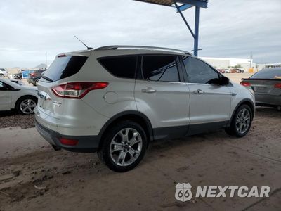Trzecie zdjęcie samochodu z tyłu: 2016 FORD ESCAPE TITANIUM VIN:1FMCU0JX7GUA39681 - miniatura