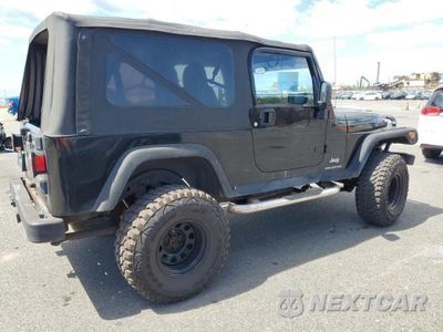 Trzecie zdjęcie samochodu z tyłu: 2006 JEEP WRANGLER / TJ UNLIMITED VIN:1J4FA44S06P772602 - miniatura