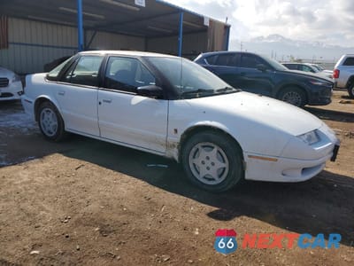 Czwarte zdjęcie samochodu z boku: 1995 SATURN SL2 VIN:1G8ZK527XSZ192304 - miniatura