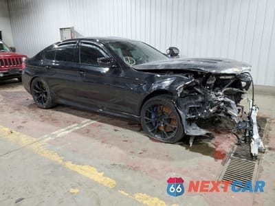 Czwarte zdjęcie samochodu z boku: 2019 BMW M5 VIN:WBSJF0C51KB447768 - miniatura