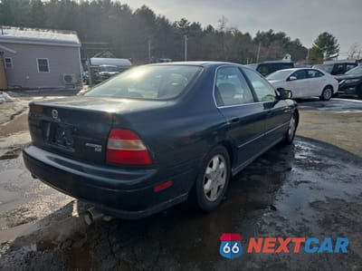 Czwarte zdjęcie samochodu z boku: 1995 HONDA ACCORD EX VIN:1HGCE6665SA021955 - miniatura