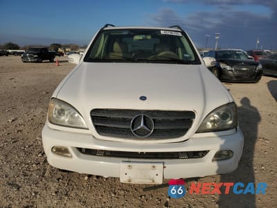 Piąte zdjęcie samochodu w środku: 2003 MERCEDES-BENZ ML 350 VIN:4JGAB57E93A420668 - miniatura