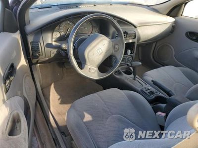 Zdjęcie 8 z 12 samochodu: 2002 SATURN SC2 VIN:1G8ZY14712Z192356 - miniatura