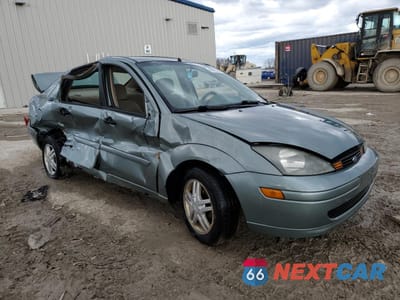 Czwarte zdjęcie samochodu z boku: 2003 FORD FOCUS SE COMFORT VIN:1FAFP34333W104260 - miniatura