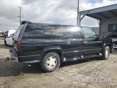 Trzecie zdjęcie samochodu z tyłu: 1996 GMC SUBURBAN K1500 VIN:1GDFK16R3TJ749952 - miniatura