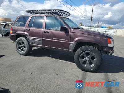 Czwarte zdjęcie samochodu z boku: 1996 JEEP GRAND CHEROKEE LIMITED VIN:1J4GZ78Y2TC311689 - miniatura