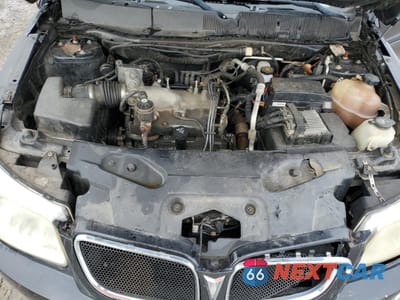 Zdjęcie 13 z 14 samochodu: 2006 PONTIAC TORRENT VIN:2CKDL63F866143461 - miniatura